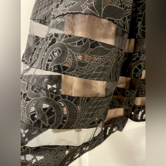 Beautiful gown worn two three times only. Might need gentle wash. Class & chic. - Picture 6 of 8